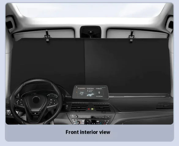 Front interior view of a car with dashboard and steering wheel.
