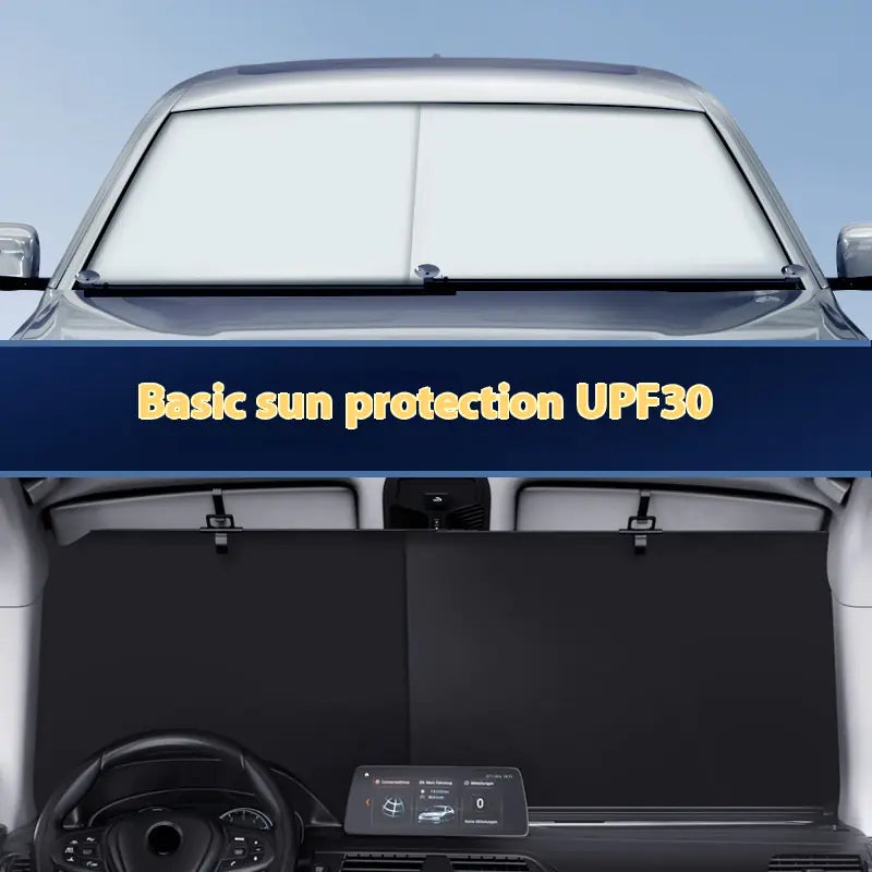 Car with a sunshade covering the windshield and back window.